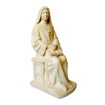 Statue de sainte Thérèse de l'Enfant-Jésus assise